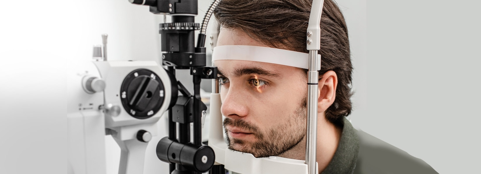 young man during eye exam in Wallhaven